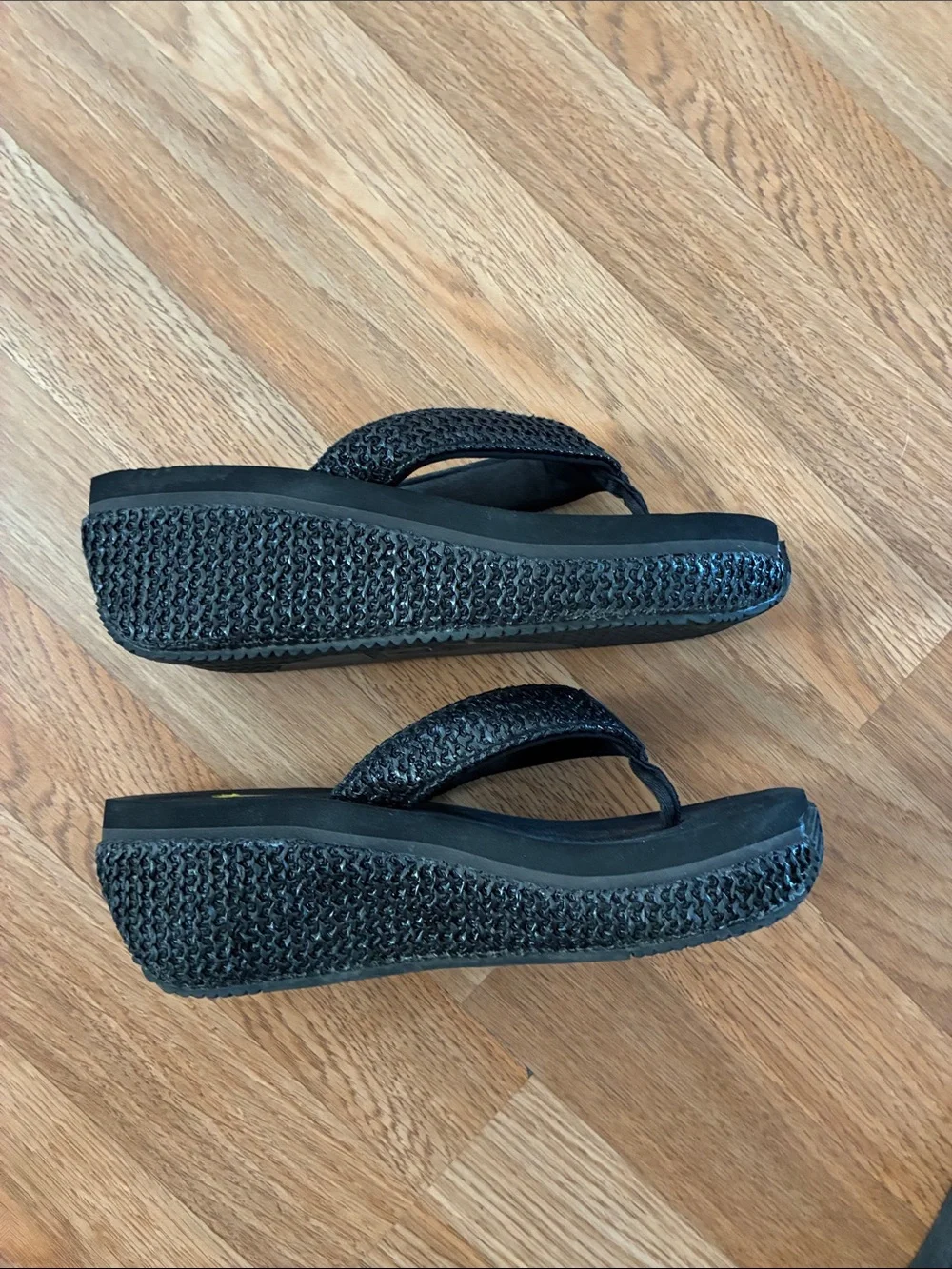 Volatile Black Braided Strap Thong Sandals with Yellow Logo